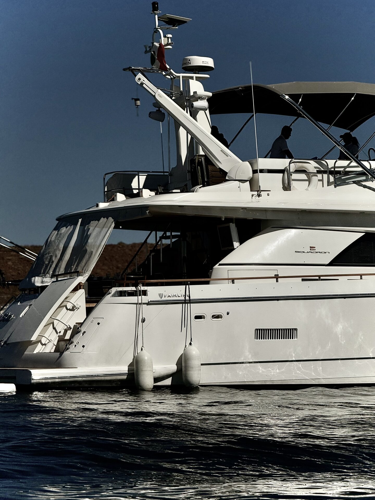 Overhead view of a luxury yacht sailing the deep blue Sea of Cortez, Baja California Sur — BAIA Atelier